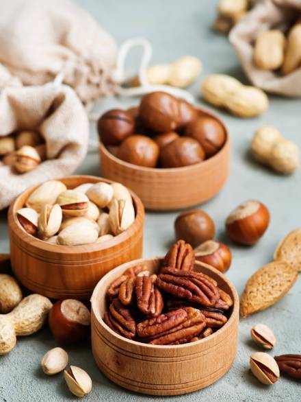 nuts on a table, different kind of nuts